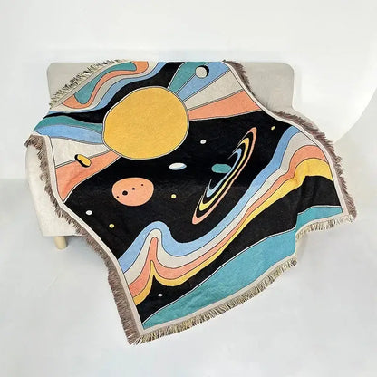 Bohemian classic design cozy woven throw blanket with vibrant cosmic sun and pastel planets decorbites bohemian classic