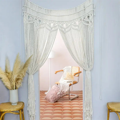 Cream-colored bohemian cotton macrame wall hanging with intricate knotwork and long fringe for bedroom decorbites decor