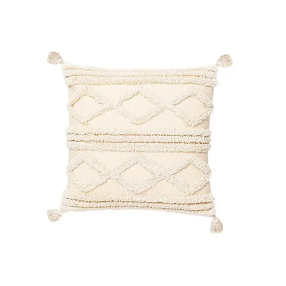 Cream-colored cushion cover with textured diamond stripe patterns and fluffy tassels for living room decor by decorbites bohemian tassel