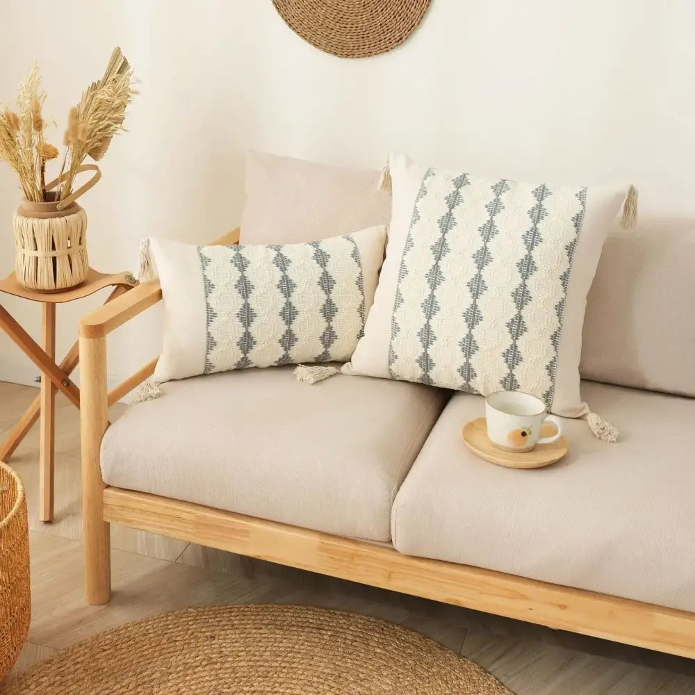 Cream-colored cushion cover with gray geometric pattern and tassels for decorbites bohemian tassel cushion decor