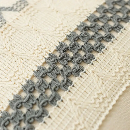 Gray crocheted lace trim with textured interlocking pattern on decorbites bohemian tassel cushion cover for living room decor