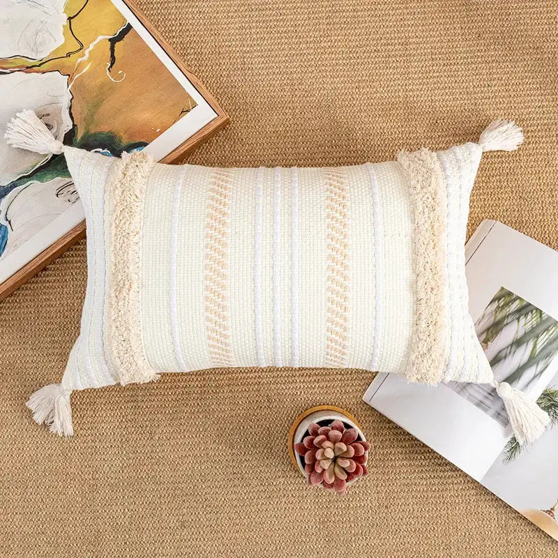Cream-colored bohemian cotton cushion cover with textured woven stripes and fringed tassels for living room decorbites decor