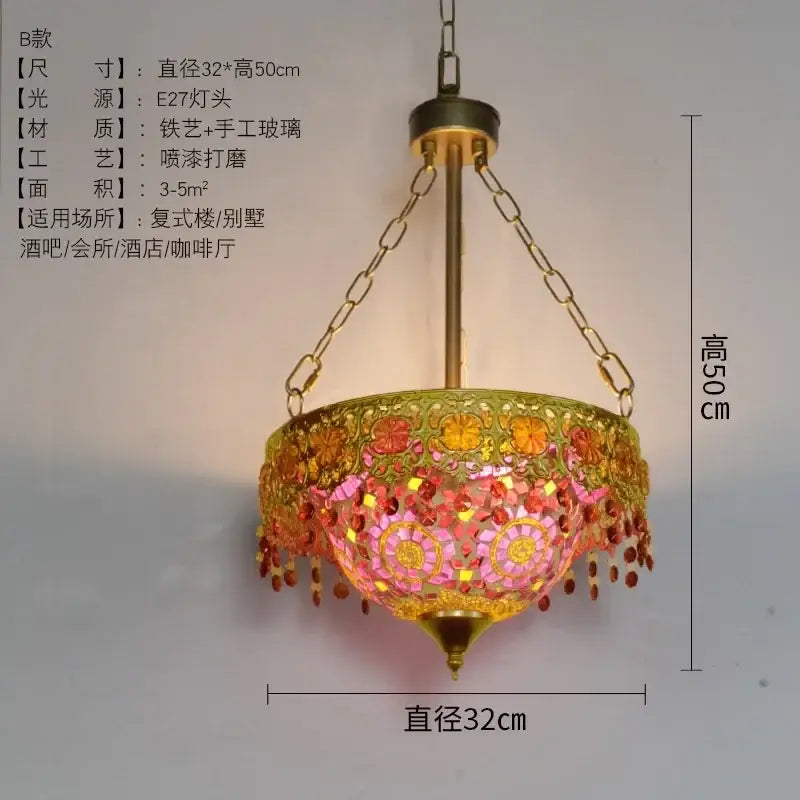 A vibrant bohemian exotic stained glass pendant light with brass frame and colorful pink orange yellow panels for decorbites