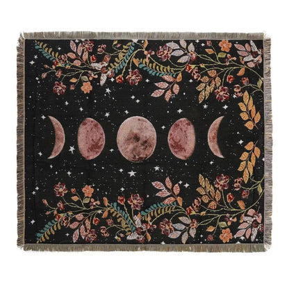 Black woven throw blanket with celestial moon phases and floral design in muted rose and gray tones decorbites bohemian throw