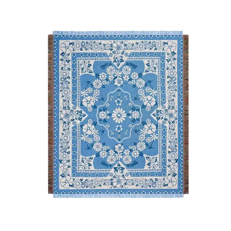 Blue and white floral patterned bohemian floral leisure blanket with fringed edges for rust and cream living room decorbites