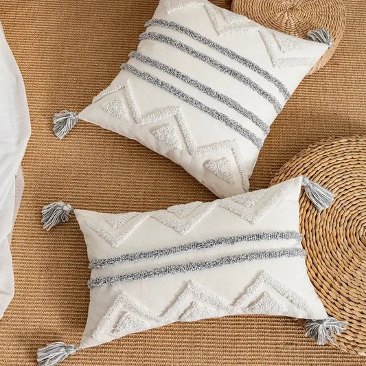 Cream-colored cushion cover with textured gray geometric patterns and tassels for living room decorbites geometric tufted style