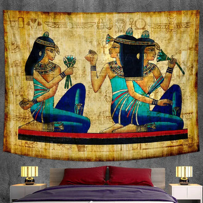 Bohemian gold and red egyptian mural tapestry featuring two women in turquoise blue attire with hieroglyphic patterns