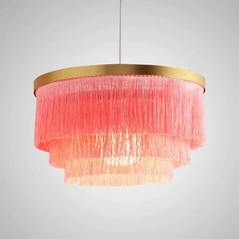 Bohemian gold tiered chandelier with cascading pink fringes and a gold-toned circular frame for bedroom decorbites bohemian gold