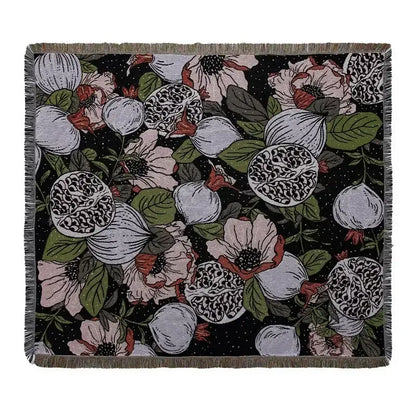 Black throw blanket with detailed floral and pomegranate pattern and fringed edges from decorbites bohemian outdoor collection