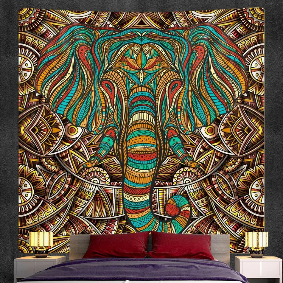 Bohemian purple and pink elephant god mandala tapestry with vibrant turquoise and gold decorbites elephant god design hanging above bed