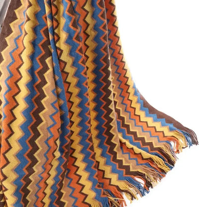 Bohemian stripe throw blanket with vibrant zigzag pattern in yellow blue orange and brown featuring fringed edge decorbites bohemian stripe