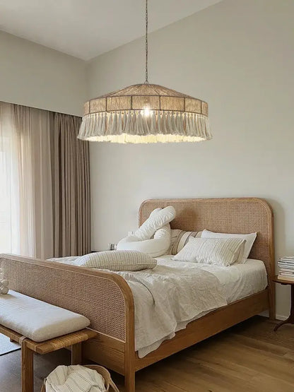 Beige woven rattan tassel chandelier with fringe detail by decorbites bohemian tassel chandelier for bedroom decor