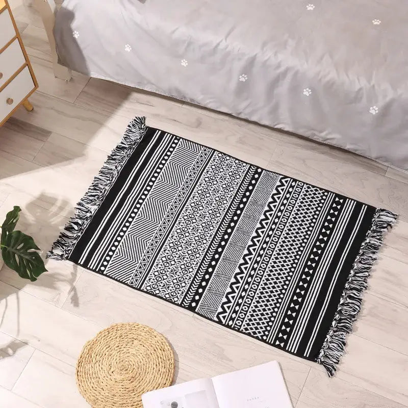 Black and white geometric patterned decorbites bohemian tassel rug with fringed edges for stylish living room decor