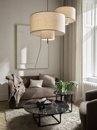 Beige linen pendant lamps with tiered modern cylindrical design for living room decorbites bohemian wabi sabi style