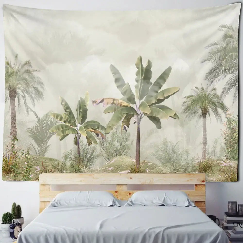 Boho banana tree mist tapestry with soft green and beige palm and banana plants hanging above wooden bed frame