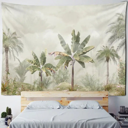 Boho banana tree mist tapestry with soft green and beige palm and banana plants hanging above wooden bed frame