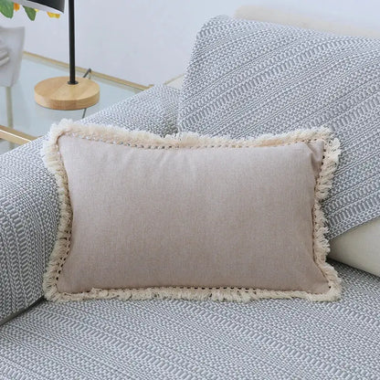 Beige rectangular linen pillow cover set with cream-colored tassels ideal for boho living room sofa decor