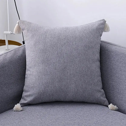 Boho beige linen tassel pillow cover set with gray textured cushion and cream tassels for living room sofa