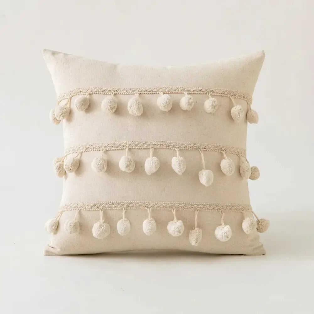 Beige cotton cushion cover with tufted fringed cream pom-poms and lace trim by decorbites for living room decor