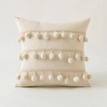 Beige cotton cushion cover with tufted fringed cream pom-poms and lace trim by decorbites for living room decor