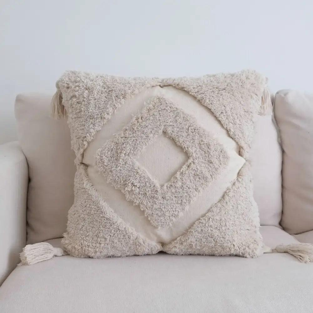 Beige textured throw pillow with layered diamond pattern and tassels for decorbites boho beige white pillow cases decor
