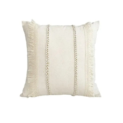 Off-white square linen cotton pillow cover with textured fabric, braided cords, and fringed edges for living room decor
