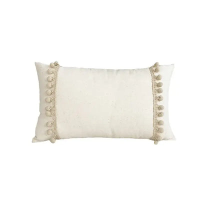 Cream-colored boho pillow cover with soft pom-poms made of linen cotton for living room decor pillow covers