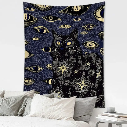 Boho black and gold cat eyes tapestry featuring a dark blue background with a central black cat and celestial decorbites cat eyes design