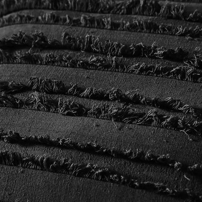 Boho black tassel striped pillow covers featuring black denim fabric with frayed distressed edges for home decor