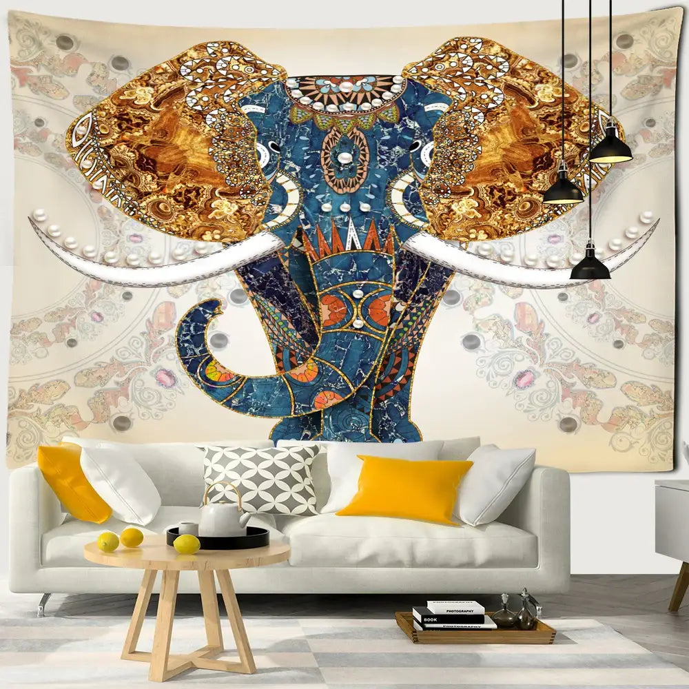 Boho blue and gold elephant mandala tapestry with intricate patterns and white tusks for bedroom wall decor by decorbites