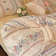Cream embroidered floral duvet cover with red blue green threadwork in decorbites boho cotton printed bedding set