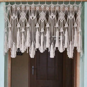 Cream-colored boho cotton wove door curtain with intricate macrame knotwork and tassels for bedroom decorbites decor