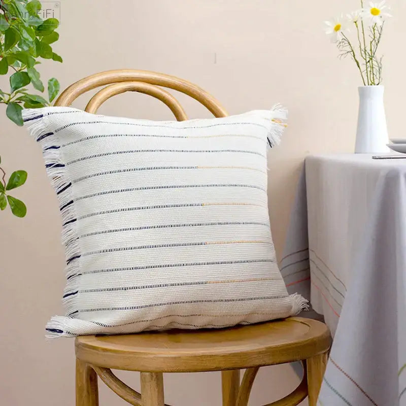 Boho cream and black decorbites handmade cotton woven cushion with navy beige gold stripes and frayed tassels corner decor