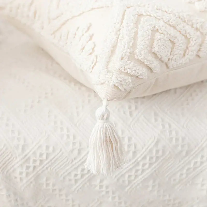 Cream-colored cotton tassels cushion cover with textured embroidered patterns for boho living room decorbites cotton tassels