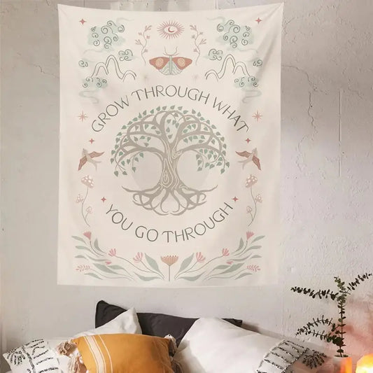A cream-colored decorbites life tree tapestry featuring a tree sun moon design with floral patterns for bedroom wall hanging