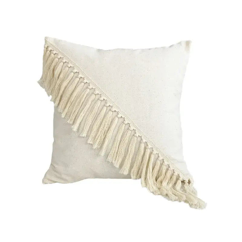Cream-colored boho cushion cover with lace floral design and diagonal tassel fringe by decorbites for living room decor
