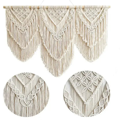 Cream-colored macrame wall hanging tapestry with intricate geometric patterns and long fringe for boho bedroom decor