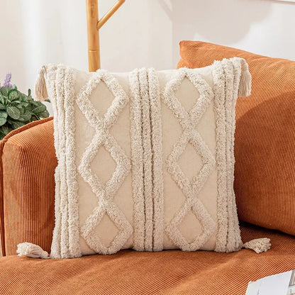 Cream-colored boho cotton pillow cover with textured woven diamond patterns and tassels for living room decorbites decor