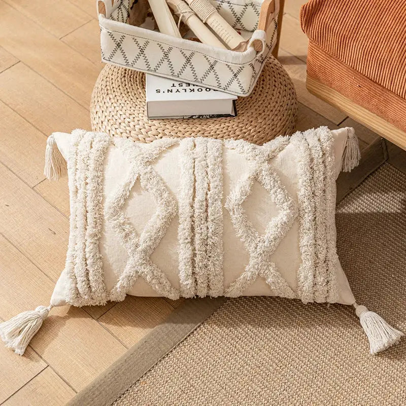 Cream-colored boho cotton pillow cover with textured woven tassels and diamond-patterned fringe decorbites boho cotton tassel decor