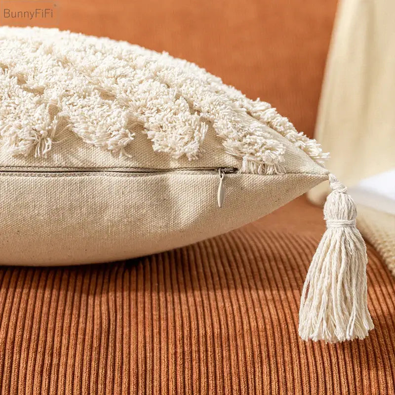 Cream pillow cover with textured cotton boho tassels and matching fringe tassel zipper pull for living room decorbites boho cotton decor