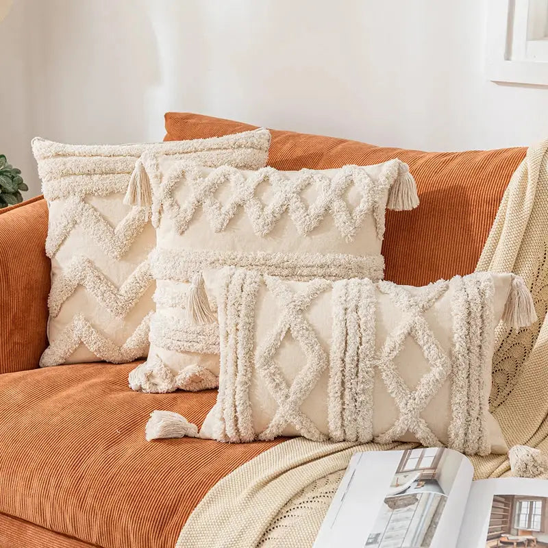 Cream-colored boho cotton pillow cover with textured woven geometric patterns and tassels for living room decorbites decor