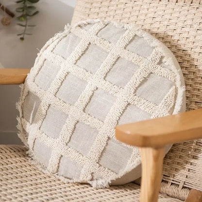 Beige linen pillow cover set featuring a textured grid pattern and frayed edges in boho cream style for bedroom