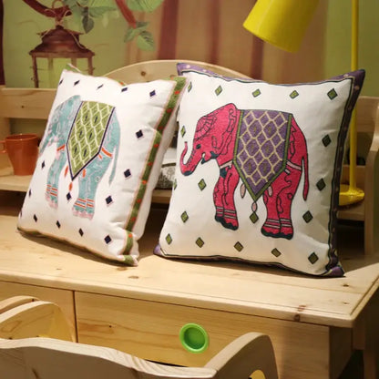Two embroidered flower elephant pillowcases in pink and teal with ethnic flower elephant decorbites design for bedroom decor