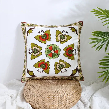 Boho farmhouse floral cream embroidered pillow covers with green red butterflies and central floral motif for living room decor