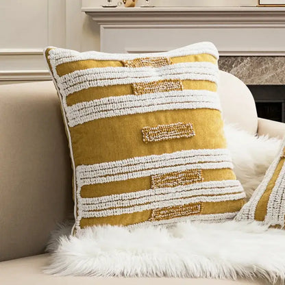 Mustard-yellow boho loop tufted cushion cover with white textured stripes and embroidered accents for living room decorbites decor