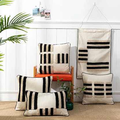 Beige and black textured throw pillows with boho geometric tufted stripes on soft fabric cushion cover for living room decor