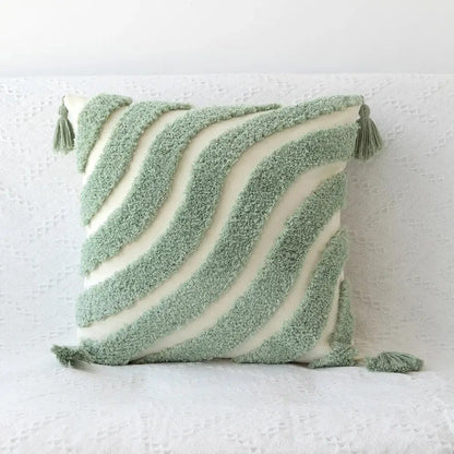 Soft mint green and cream decorbites boho geometric tufted cushion cover with textured wavy stripes and tassels