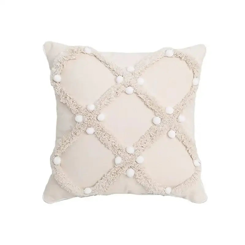 Beige boho geometric tufted pillow cover with textured frayed crosshatch pattern and white pom-pom accents for living room decorbites cushion cover set