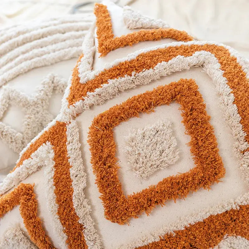 Boho geometric tufted pillow cover set of 4 with warm orange cream tones and plush fringed yarn accents for living room decorbites cushion cover