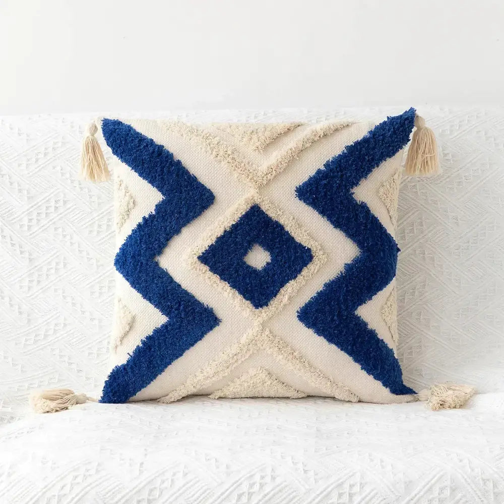 Cream-colored boho geometric tufted pillow cover with bold navy blue patterns and tassels for living room decorbites cushion cover set of 4